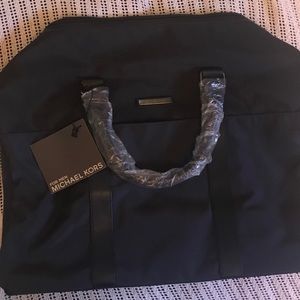 Micheal Kors duffel styled bag for men